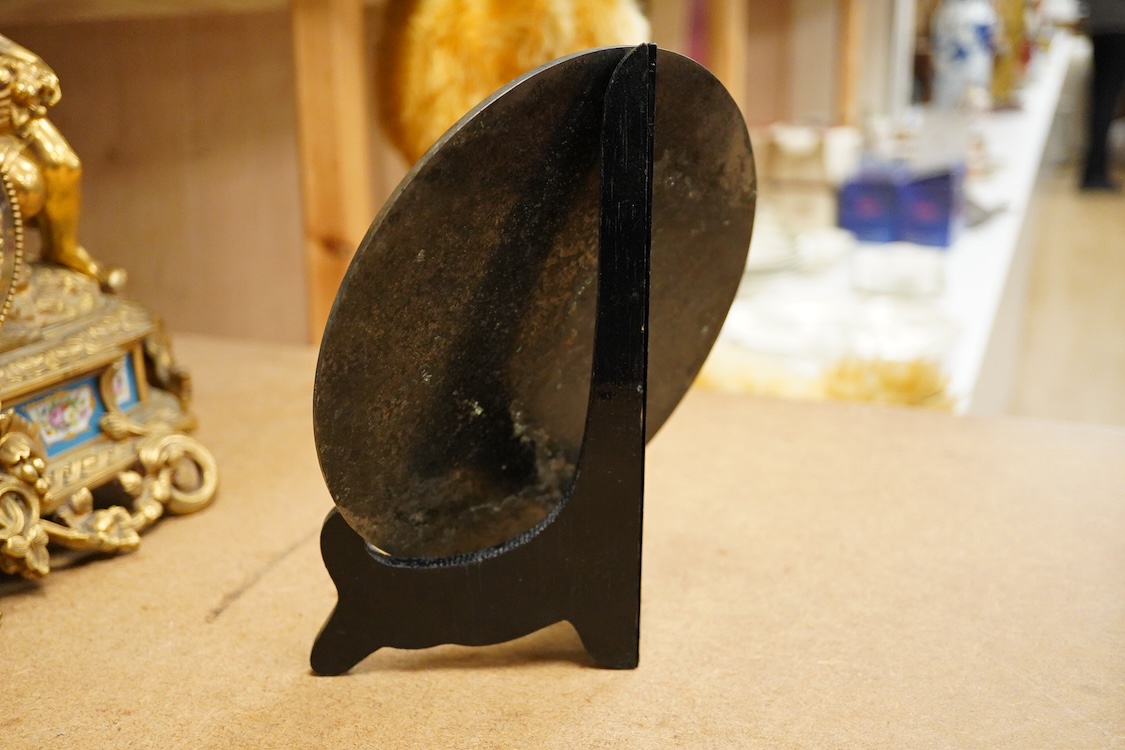 Chinese bronze ‘dragon’ mirror back, 19cm in diameter